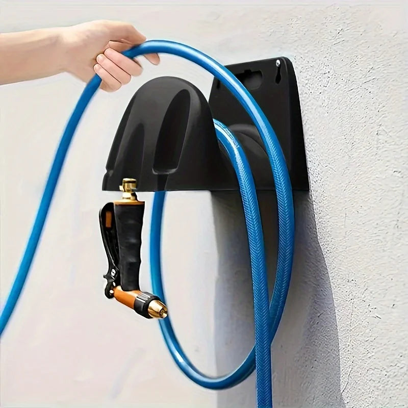 A wall mounted garden hose rack made of heavy-duty plastic for storing outdoor garden watering and irrigation tools