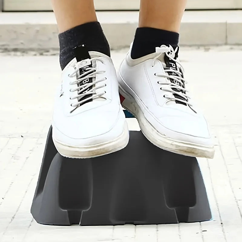 A wall mounted garden hose rack made of heavy-duty plastic for storing outdoor garden watering and irrigation tools